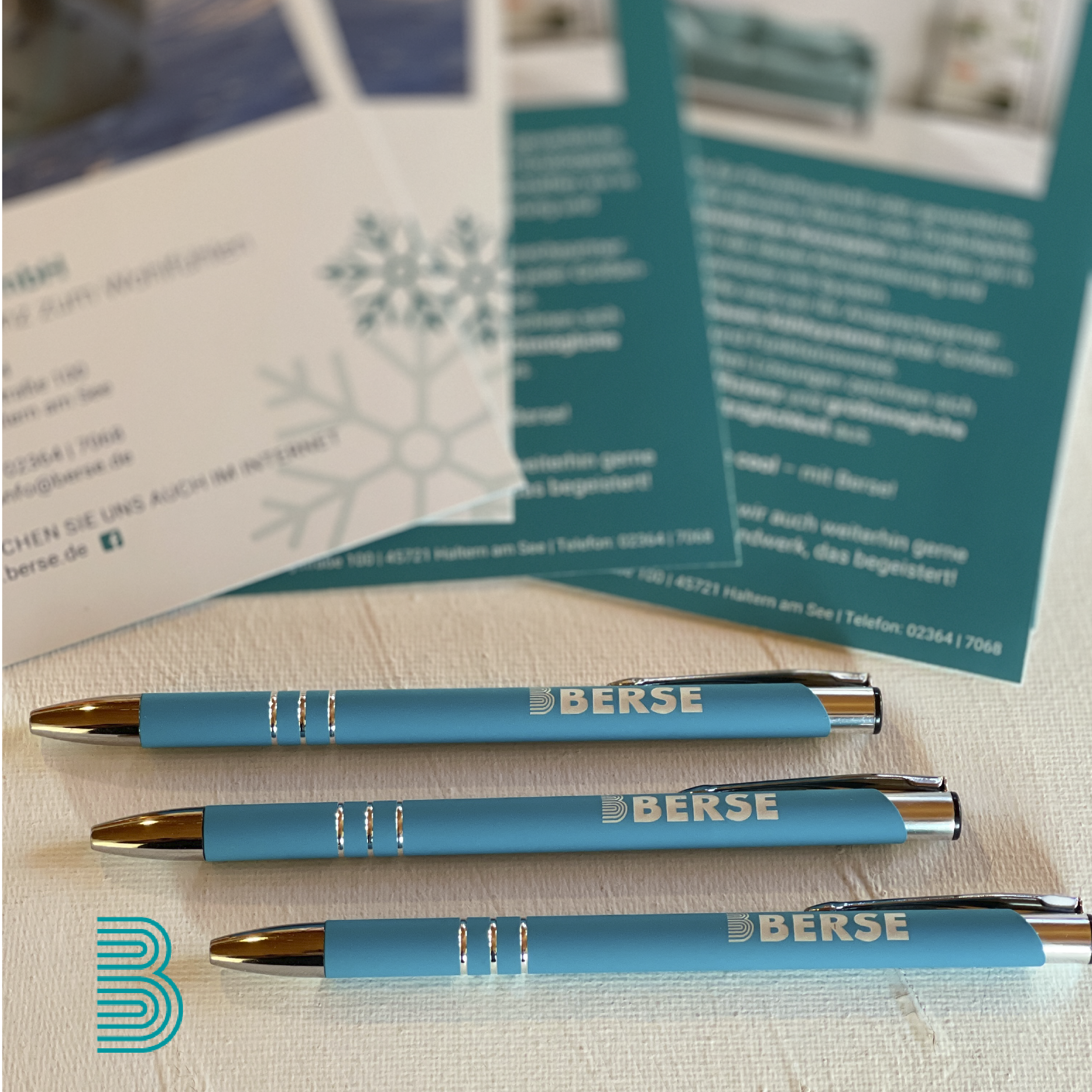 Kugelschreiber und Flyer der Berse GmbH.